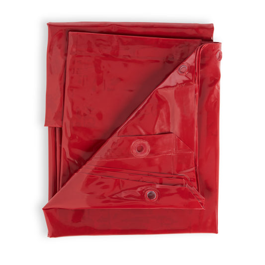 Folded red welding screen with metal grommets around the edges